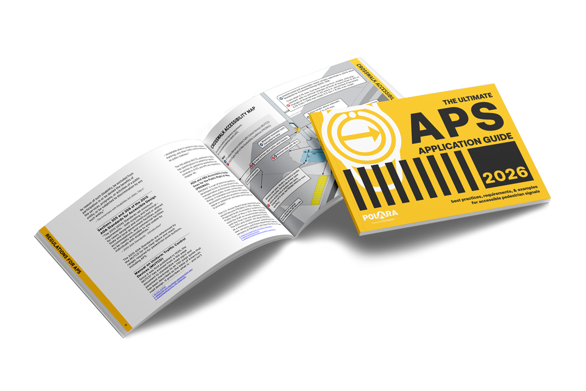 APS-Guide-Mockup Mockup of the Polara APS Application Guide 2026, showing one copy open with a visible two-page spread of accessibility regulations, maps, and diagrams, and a second copy closed with the yellow cover displayed on top of the open guide.